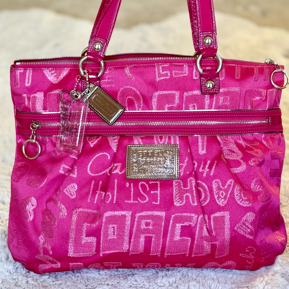 Coach Poppy limited addition metallic pink bag.